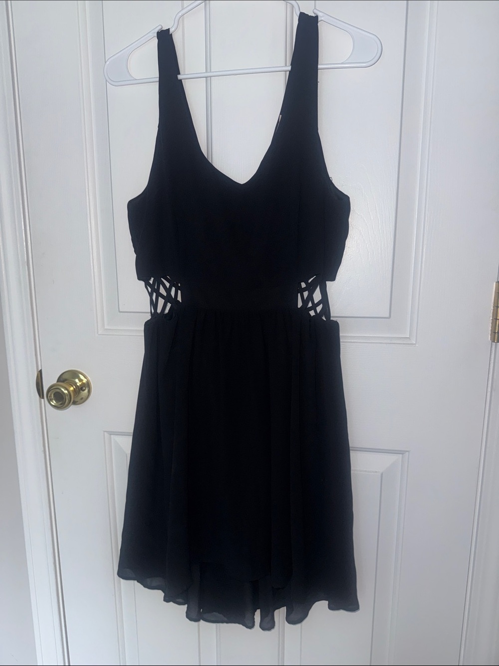 Lush Black Sleeveless Mini Dress with Lattice Side Cutouts
